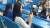 이승엽의 아내 이송정 씨가 15일 대구 삼성 라이온즈 파크에서 열린 2017 KBO 올스타전에서 시구 행사를 하는 남편과 두 아들의 모습을 영상으로 담고 있다. [연합뉴스]