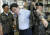 3일 강원 화천군 육군 7사단을 방문한 바른정당 유승민 의원이 전투복을 입고 있다. [연합뉴스]