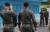 지난해 4월 경기도 파주시 판문점에서 북한군 경비병이 마이크 펜스 미국 부통령 일행의 사진을 찍고 있다.
