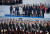 지난해 7월 프랑스 바스티유의 날 기념 열병식에 참석한 도널드 트럼프 미국 대통령과 에마뉘엘 마크롱 프랑스 대통령 부부(연단 위 가운데). [로이터=연합뉴스]