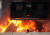 사진은 용산 참사가 발생한 2009년 1월 20일 서울 한강로 2가 재개발지역의 남일당 건물 옥상의 사고 현장. 경찰의 강제진압이 진행된 가운데 옥상에 설치한 망루에 불이 나 쓰러지고 있다. [연합뉴스]