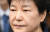 박근혜 전 대통령이 지난해 5월 23일 오전 서울중앙지법 417호 법정에 출석하고 있다. [사진공동취재단]