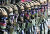 북한군 특수부대 요원들이 9일 평양 김일성광장 에서 열린 북한 정권 수립 70주년(9·9절) 기념 열병식에서 행진하고 있다. 중국 CC-TV는 이번 열병식에 참가한 시민은 약 10만 명, 군인은 1만 2000여 명이라고 보도했다. [AP=연합뉴스]
