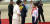 문재인 대통령과 김정숙 여사가 18일 평양 순안공항에서 북한 화동으로 부터 꽃을 받고 있다. [화면캡쳐]