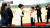 18일 평양 순안공항에서 문재인 대통령과 김정숙 여사에 북측 화동들이 경례하고 있다. [사진 YTN]