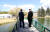 문재인 대통령(왼쪽)과 김정은 국무위원장이 20일 삼지연초대소 다리 위에서 산책을 하고 있다. [평양사진공동취재단]