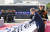 문재인 대통령이 국군의 날인 1일 오전 서울공항에서 열린 국군 유해 봉환행사에서 68년 만에 돌아온 국군 유해 64위에 6.25 참전 기장을 수여하고 있다. [연합뉴스]