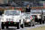  아베 일본 총리가 차량에 올라 자위대를 사열하고 있다. [로이터=연합뉴스]