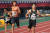박태건(오른쪽)이 15일 전북 익산종합운동장에서 열린 제99회 전국체육대회 육상 남자일반부 200ｍ에서 대회 신기록으로 종점을 들어오고 있다. 바로 왼쪽은 이재하.[연합뉴스]