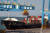 중국 산둥성 칭다오항에서 크레인이 컨테이너를 선박 위로 운반하고 있다. [EPA=연합뉴스]
