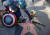 캡틴 아메리카 분장을 한 시민이 12일(현지시간) 스탠 리를 추모하 미국 할리우드 명예의 거리에 새겨진 그의 이름 앞에 헌화를 하고 있다. [EPA=연합뉴스]