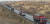 중국발 미세먼지의 원인 중 하나인 발전용 석탄을 실어나르는 네이멍구의 대형 트럭들. 장세정 기자