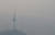 26일 오전 서울 N서울타워가 미세먼지에 가려져 희미하다. [뉴스1]