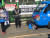 11월22일 경기도 여주에 있는 CJ대한통운 한 택배터미널에서 택배노조소속 택배기사가 택배배달을 막기위해 차량앞에 누워있다. [CJ대한통운 제공]