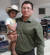 올해 캐러밴 사태의 배후 인물로 지목되는 온두라스 자유재건당(Libre·리브레) 소속 바르톨로 푸엔테스 전 국회의원. 이민자들과 이동하면서 찍은 사진을 페이스북에 올렸다. [사진 페이스북]
