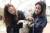김효진 동물보호단체 케어 홍보대사가 지난해 4월 10일 오후 경기도 남양주시의 한 식용견 농장에서 구조 된 개를 살펴보고 있다. [뉴스1]