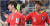 16일 오후(현지시간) 아랍에미리트 아부다비 알 나얀 스타디움에서 열린 2019 AFC 아시안컵 C조 조별리그 3차전 한국과 중국의 경기, 한국 황희찬-황의조가 하이파이브를 하고 있다.(왼쪽사진) [뉴시스]