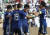 일본의 다케이로 토미야스(오른쪽 둘째)가 21일 열린 아시안컵 16강전 사우디아라비아전에서 팀의 두 번째 골을 넣은 뒤 동료들의 축하를 받고 있다. [AP=연합뉴스]