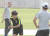 18일 아랍에미리트 두바이 NAS 스포츠 컴플렉스에서 열린 축구 국가대표팀 회복훈련에서 파울루 벤투 감독이 몸을 풀고 있는 이승우 방향을 바라보고 있다.[연합뉴스]