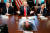 Acting Secretary of the Interior David Bernhardt, left, and acting Secretary of Defense Patrick Shanahan, right, listen as President Donald Trump speaks during a cabinet meeting at the White House, Wednesday, Jan. 2, 2019, in Washington. (AP Photo/Evan Vucci)