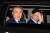 2017년 5월 9일 출구조사를 확인한 뒤 국회로 출발하는 문재인 대통령의 차량에 김경수 지사가 동승해 손을 흔들고 있다. [뉴시스]