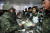  나경원 자유한국당 원내대표(오른쪽 둘째)가 30일 강원 12사단 수색중대를 방문해 장병들과 오찬에 앞서 배식봉사를 하고 있다. [연합뉴스]