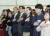  박상기 법무부 장관(가운데)이 지난달 21일 서울 용산구 국립한글박물관 대강당에서 열린 제1회 대한민국 국적증서 수여식에서 국기에 대한 경례를 하고 있다. [법무부 제공]