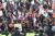 김진태 자유한국당 의원 지지자들이 13일 서울 여의도 국회 본청 앞에서 태극기와 피켓을 들고 &#39;김진태 의원에 대한 윤리위 제소 취소&#39;를 요구하고 있다. [뉴스1]