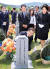 문재인 대통령이 지난 2018년 6월 6일 국립대전현충원에서 열린 현충일 추념식을 마친 뒤 천안함 46용사 묘역을 찾아 고 박경수 상사의 묘비를 쓰다듬고 있다. [연합뉴스]