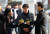 경북 예천군의회 박종철 의원이 경찰 조사를 받기 위해 예천경찰서로 출석하며 기자들의 질문을 받고 있다.[연합뉴스]