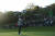 지난 18일 열린 PGA 투어 제네시스 오픈 최종 라운드 18번 홀에서 퍼터를 들어올리며 퍼팅 라인을 읽고 있는 홈스. [AFP=연합뉴스]