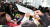 민주노총과 시민단체 회원들이 27일 경기도 고양시 킨텍스에서 열린 자유한국당 전당대회장 앞에서 자유한국당 지지자들(오른쪽)과 몸싸움을 하고 있다. [뉴스1]