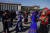 중국 소수민족 전인대 대표들이 인민대회당 앞에서 기념촬영을 하고 있다. [AP=연합뉴스]