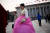 한복을 입은 조선족 대표가 인민대회당을 떠나고 있다.[AFP=연합뉴스]