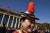 소수민족 대표의 모자에 붉은 술이 달려 있다. [AFP=연합뉴스]