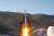 2012년 12월 12일 평안북도 철산군 동창리 서해 위성 발사장에서 우주 발사체 은하 3호가 발사되고 있다. [노동신문]