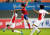2010년 11월 중국 광저우 티엔허 경기장에서 열린 아시안게임 한국과 아랍에미레이트의 준결승전에서 조영철이 수비를 피해 슛을 날리고 있다.[중앙포토]