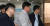 클럽 ‘버닝썬’과 경찰 간 유착 고리로 지목된 전직 경찰관 강모씨(가운데). [연합뉴스]