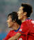 2010년 중국과 아시안게임 경기에서 골을 터트린 김정우(오른쪽)가 박주영과 함께 기뻐하고 있다.[중앙포토]