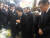지난 1월 도쿄 신오쿠보역에서 일본 지하철 선로에 떨어진 취객을 구하려다 숨진 고 이수현 씨의 어머니 신윤찬 씨가 두 손 모아 아들의 명복을 빌고 있다. [연합뉴스]