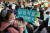 지난해 11월 21일 서울 여의도 국회에서 &#39;저출산문제해결,난임치료를 위한 바우처정책 예산도입 관련 정책간담회&#39;에서 한 참가자가 아이와 함께 손피켓을 들고 난임지원 정책 개선을 촉구하고 있다. [뉴스1]
