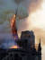 15일(현지시간) 발생한 화재로 프랑스 파리 노트르담 대성당의 첨탑이 무너져 내리고 있다. [AFP=연합뉴스]
