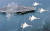 미국의 핵추진 항공모함 칼빈슨함과 일본 항공자위대가 2017년 동해상에서 합동훈련을 실시했다. 일본의 F15 전투기가 칼빈슨함 위로 비행 중이다. [AP=연합뉴스]