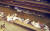 &#39;성 계단&#39;의 나무 덮개를 제거 한 뒤 가족 사진, 자필 기도문, 동전 등이 발견됐다. [사진 유튜브 캡쳐]