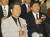 김대중 전 대통령의 장남 김홍일 전 민주당 의원이 20일 오후 5시쯤 별세했다. 향년 71세.   사진은 지난 1996년 4월 16일 국민회의 당선자대회에서 김대중 전 대통령과 김 전 의원이 국기에 대한 경례를 하고 있는 모습. [연합뉴스]
