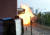 지난 21일(현지시간) 스리랑카 콜롬보의 성 앤서니 교회 인근 밴에서 폭발로 불길이 치솟고 있다.[ 로이터=연합뉴스]
