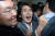 나경원 자유한국당 원내대표가 25일 오후 서울 여의도 국회 의안과 앞에서 몸싸움에 휘말려 비명을지르고 있다. [뉴스1]
