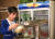   평양 시내의 &#39;만수교&#39; 술집에서 판매원이 컵에 맥주를 따르고 있다.[타스=연합뉴스].>