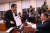 자유한국당 의원들이 26일 문체위 회의실로 사개특위 장소를 변경한 이상민 위원장에게 항의하고 있다. [연합뉴스]