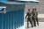 1일 오전 판문점 공동경비구역(JSA)에서 북한 경비병들이 판문각을 나와 근무지로 이동하고 있다.[사진공동취재단]